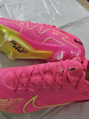 Nike Bright Pink Soccer Cleats with Neon Yellow Accents